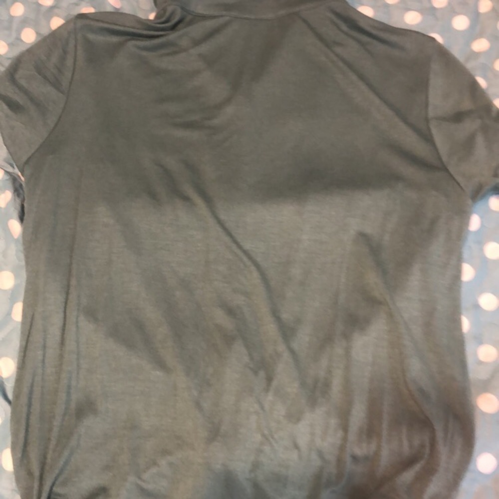 a cute green button up shirt